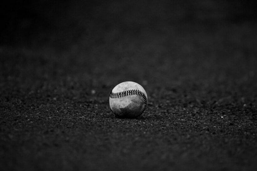 selective focus grayscale photography of baseball